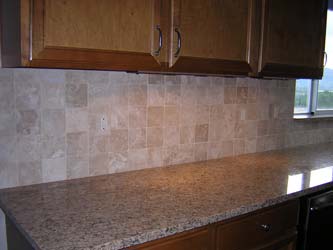 Tiled in Durango travertine switch cover outlet plates