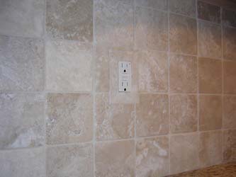 Tiled in Durango travertine outlet cover plate